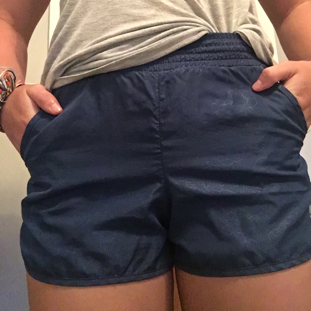 Navy blue athletic shorts.